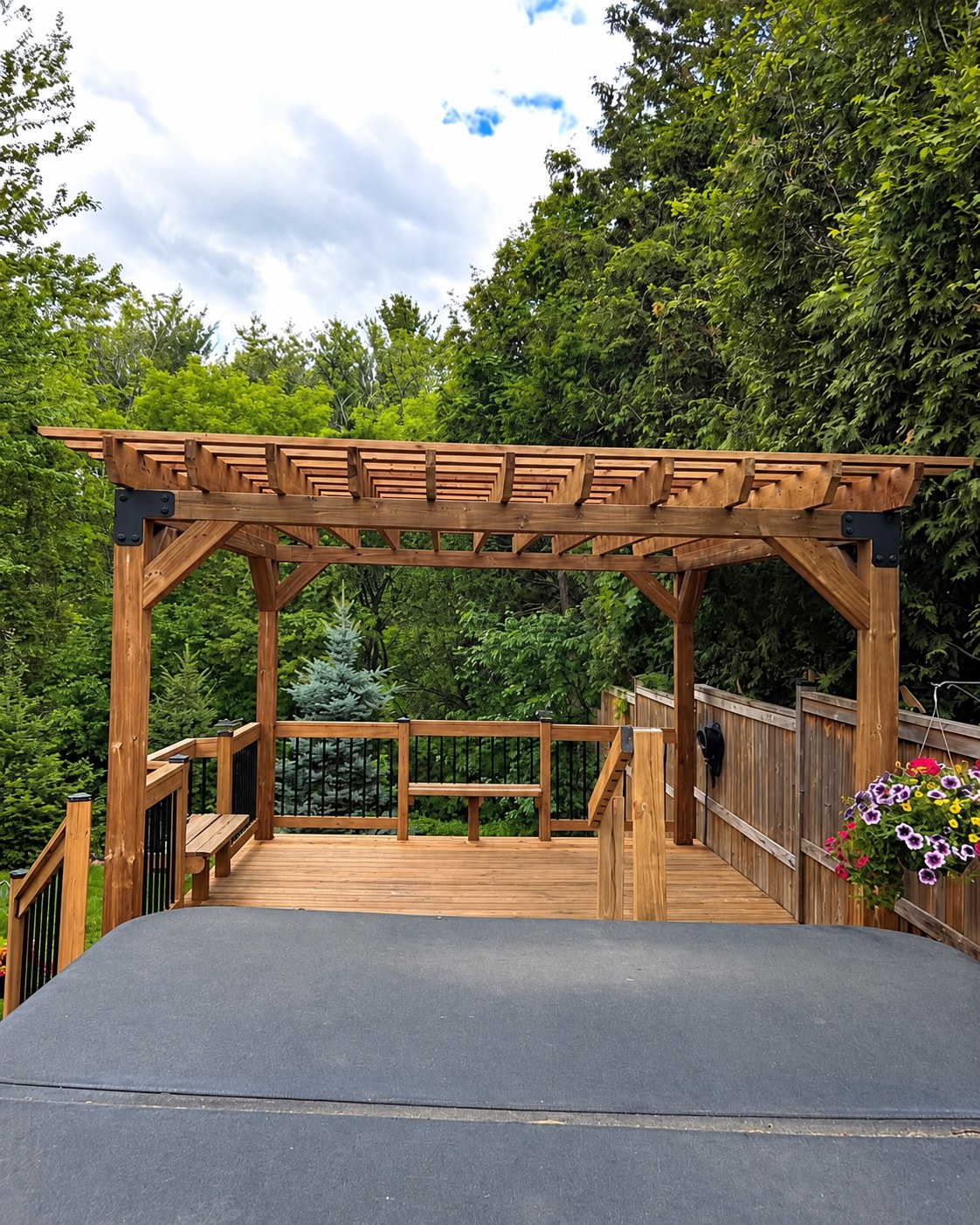 Timber pergola and railings viewed across the deck.